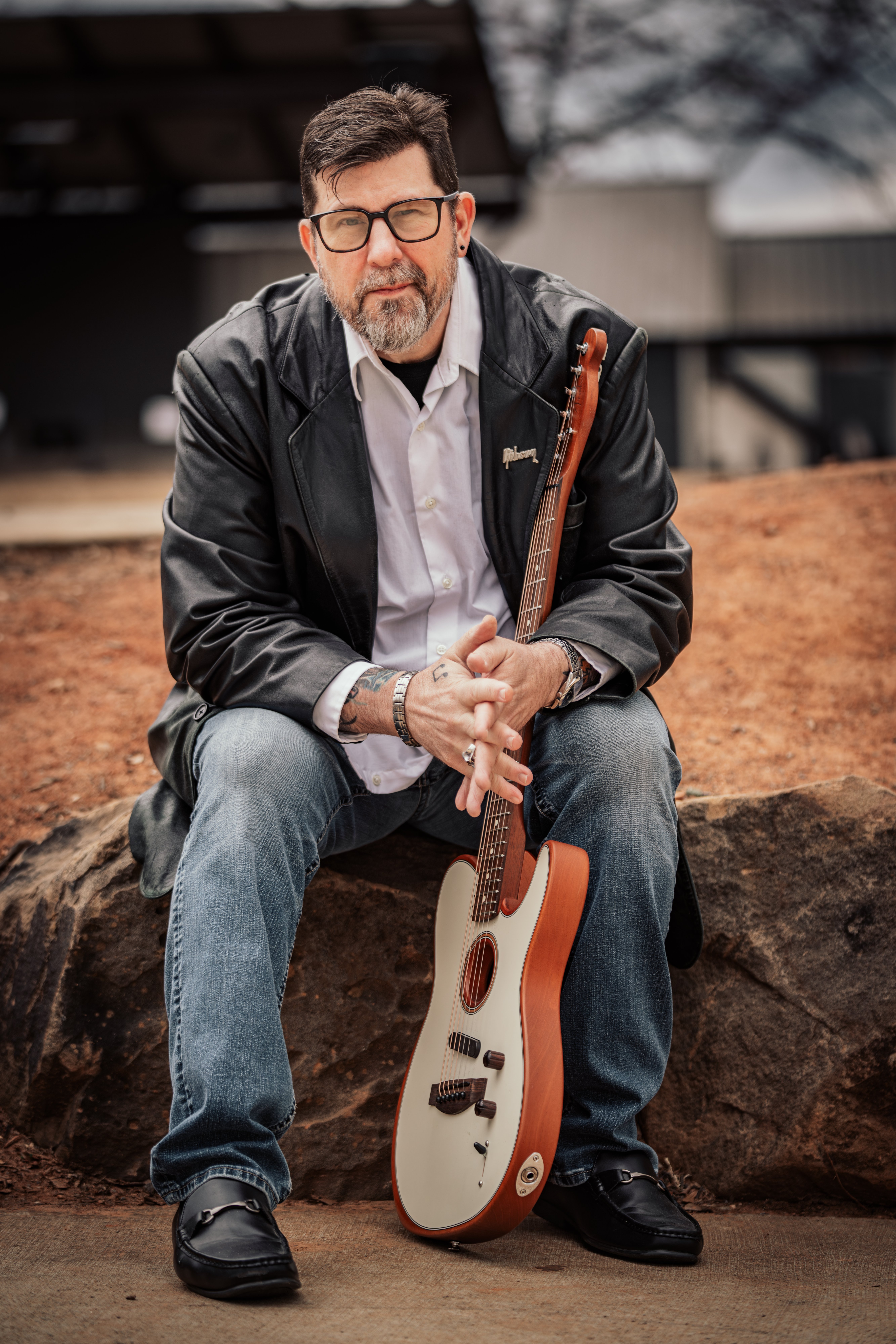 Kyle Smith with guitar
